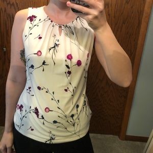 Cream and pink floral sleeveless blouse